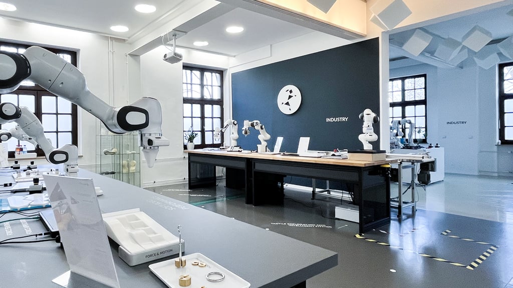 Franka Emika showroom with different robot applications.